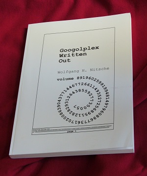 Googolplex Written Out (photo of one soft-cover book)